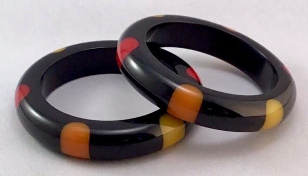 JE24 Judith Evans pr black resin bangles with 6 dots